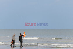 Migranci na plaży Gravelines - AFP