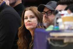 Leo di Caprio i Amy Adams na meczu NBA