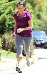 Alanis Morissette jogging around her neighborhood