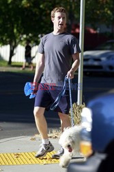 Mark Zuckerberg takes his dog Beast for a walk 